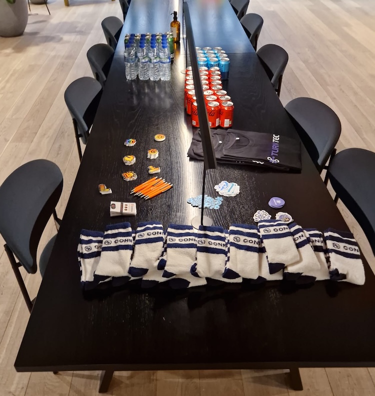 a swag table at a Grafana x Confluent event
